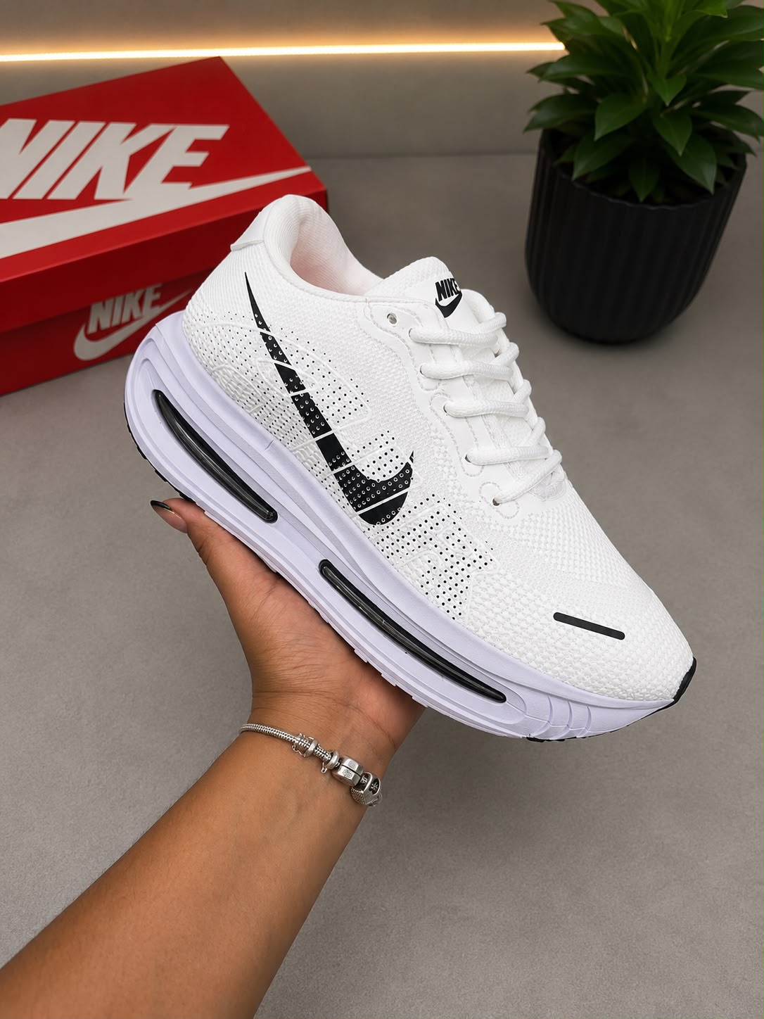 Tênis Nike Vomero - Imagem 5